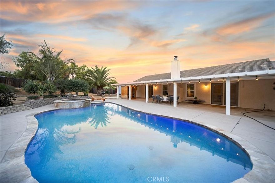 Welcome to this treasured single-level retreat in the heart of Fallbrook! This beautifully remodeled 3-bedroom, 2-bathroom home offers stylish living space on over half an acre of private land.

The highlight of the property is the heated saltwater pool, built in 2013, enhanced with gorgeous LED lighting for year-round resort-style enjoyment. Newly installed sauna to relax in before or after a nice swim. Inside, the home has been thoughtfully updated throughout with modern finishes, abundant natural light, and top-line LED lighting.  The spacious kitchen and open-concept layout make entertaining effortless, while the bedrooms provide comfort and privacy for family and guests. Other exterior features, several fruit trees, full-size Tuf Shed, and a fully constructed chicken coop. 

For hobbyists or extra storage, the property includes not just one but two full-size garages, including a dedicated workshop. RV parking. Plenty of room to add an ADU!! 

With public utilities- low operating costs, and lower taxes, you’ll enjoy the best of both worlds: the convenience of modern services with the tranquility and space of a private Fallbrook estate.

This is a rare opportunity to own a move-in-ready home with room to grow, play, and relax—just minutes from downtown Fallbrook.