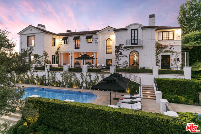 Iconic Gem in the heart of Bel Air. The Fredricks Residence designed by Gordon Kaufmann is the ultimate in 1920's Georgian Splendor. By far the most elegant traditional on the market today. Complete privacy on 1.6 acre promontory with jetliner views to the ocean. Period details abound and are complimented by exceptionally high 14ft ceilings. Sophisticated and elegant public rooms include a vast living room, circular wood-paneled library, soaring entry hall with original floating staircase and an epic dining room that can accommodate 20 guests. Massive walls for art, scaled for grand-entertaining and state of the art home automation. Gourmet Kitchen with adjacent family room. Master suite is a world unto itself with large entrance vestibule, office, gym and dual baths. Grounds include large gated motor court, guest house, mosaic pool, greenhouse and manicured rolling lawns. Rich in History and Pedigree. A trophy for generations. Shown only to prequalified buyers.