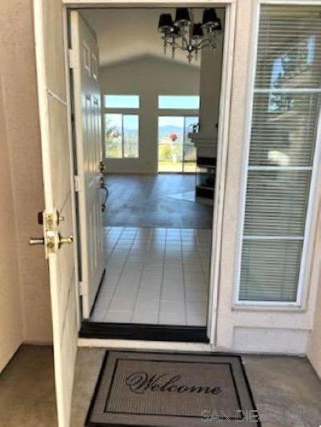 Welcome to the serene, peaceful neighborhood located in the desirable Crown Hills Community. Step into this beautiful single story home that has a spacious open layout with vaulted ceilings and much natural light. Kitchen has a unique dining nook with outward nature views. A gas log fireplace adorns the living area. Master suite allows for privacy and sits apart from other bedrooms. Brand new interior painted throughout, new baseboards , and new flooring throughout. Unwind and Step into a very well cared for low maintenance backyard and take advantage of the sweeping, gorgeous 180 degrees views surrounded by nature. Community amenities include: Pool, Spa, Tennis Courts, Clubhouse, and many more. Home is just minutes away for easy access to the