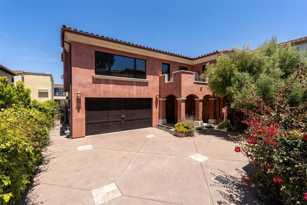 Welcome to 245 Driftwood Street in the beautiful beach town of Morro Bay. This 4 bedroom, 2.5 bath home is close distance to the Embarcadero where you can shop, dine, wine taste, kayak and walk the beach to enjoy the beautiful view of the famous Morro Rock. This two-story home features tall ceilings, wood flooring and tile throughout, stainless steel appliances and landscaping all around. This Mediterranean style home is set back from the street providing extra privacy. The bottom bedroom has its own separate entrance and a covered patio. The great room is the perfect place to sit next to the fireplace and take in the views from the large windows. The kitchen is great for entertaining with its large granite center island, Dacor stove and custom cabinetry. Off the kitchen is one of two balconies where you can enjoy the sunshine and coastal breezes. The spacious master suite has a fireplace, balcony and a large bathroom complete with a walk-in shower, jacuzzi tub, dual sinks and a separate vanity with plenty of storage space. There is even a Stiltz Lift which is an alternative to using the stairs to the second story. You won't want to miss the opportunity to own a home close to the ocean in the charming town of Morro Bay! OPEN HOUSE 7/12. 11:00 am-1:00 pm