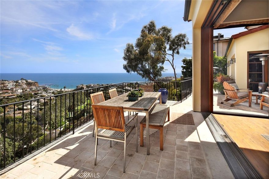 Live in Emerald Bay - Experience the ultimate in luxury coastal living inside the premier private beach community of Emerald Bay. Upon entering the home, one is immediately mesmerized by the captivating views. This unique sensory experience is afforded by the property resting on the ideal view elevation, overlooking acres of lush green parks that gracefully blend into the pristine white sand beach and sparkling blue Pacific Ocean. Ample sized decks, private patio and disappearing pocket doors all work in concert to create a seamless indoor/outdoor living space perfect for entertaining. Thoughtfully designed to capture the sweeping views from each and every room, this home offers resort-style beach living at its finest. The property boasts 5 bedrooms (all en suite), 6 baths, gourmet kitchen, multiple ocean view decks, private courtyard, wine cellar, three car garage and ocean view spa! Situated on a quiet cul-de-sac providing peaceful tranquility, this is the dream location to enjoy all of Emerald Bay's highly prized amenities including: Private White Sand Beach, 6 Tennis Courts, Volleyball, Pool Complex, Basketball Court, Parks, Community Events, Concerts, Child Programs/Camps, Classes and more!