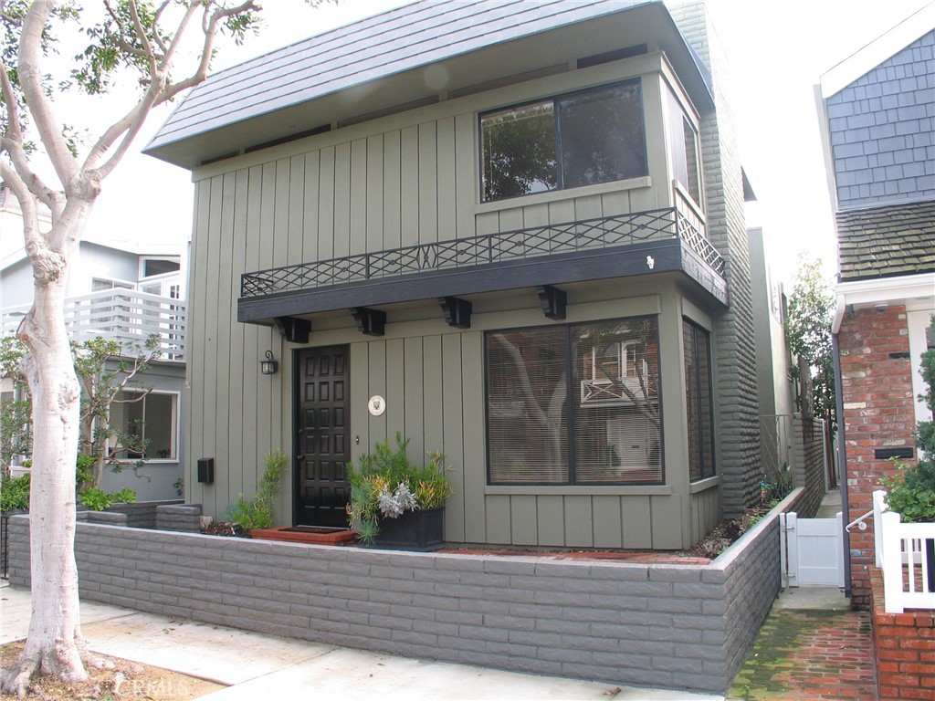 This home is in a great location on the main island near the Balboa Island Ferry and Island Park. This wonderful 3 bedroom and 3 bath two story front house has plenty of room and a nice private bonus room downstairs with a full bath that could be used as a TV room or home office. This home also has many upgraded kitchen appliances including a stainless refrigerator, dishwasher and ovens. The upstairs master bedroom has a fireplace and nice view of the harbor. All new flooring throughout the house gives this a clean and modern look. The raised front patio on this tree lined street will not disappoint and if you like privacy you will have a private brick patio just off the kitchen. It also has two car garage parking with direct access to the house.