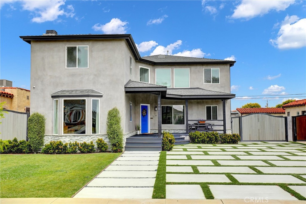 AVAILABLE 8/15/2025. Stunning 5 bedroom residence with 3466 sq ft of luxurious living space, minutes from beaches, Hollywood, LAX and Sofi. CAN BE RENTED WITH FURNISHINGS FOR AN ADDITIONAL $500. Downstairs features a bright living room with huge picture windows and a fireplace, an impeccable chef’s kitchen and nook, an open concept dining room, two bedrooms (one being used as an office), a sumptuous spa bathroom, an impressive family room with direct patio access, and a mudroom leading to the backyard and separate storage area. Upstairs you’ll find the spectacular primary suite and retreat featuring his and hers walk-in closets, a lavish spa bathroom with a clawfoot tub, and a balcony overlooking your backyard oasis. There are also two additional bedrooms (one being used as a gym), a third full bathroom with dual vanity sinks, and a laundry room with cust. om-built chutes and storage. The backyard oasis is surrounded by lush greenery, providing privacy for you to enjoy the expansive outdoor living space featuring a kitchen with built-in grill, refrigerator, sink, and eating area, covered with a trellis, pre-wired for 2 TVs and surround sound. There’s also a patio for private sunbathing, a huge lawn for games and activities, room for RV parking, a dog run for your fur babies, and an enclosed yard behind the detached two car garage. This opulent home, perfect for entertaining and multigenerational living, also has a tankless water heater and two separate heating and AC units. Don’t miss this rare opportunity in the heart of LA.