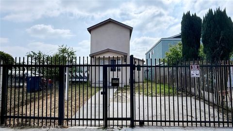 Photo of 11154 Towne Ave, Los Angeles, CA 90061 (MLS # IV26085992)