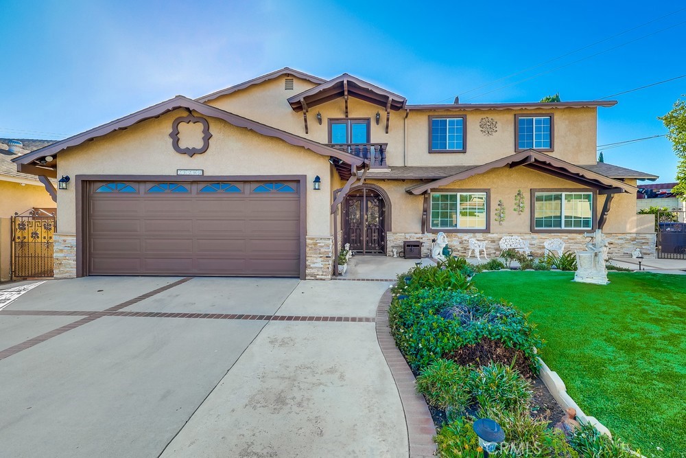 On the market for the first time in 30 years, this exceptionally well-maintained residence showcases decades of pride in ownership. Thoughtfully updated with new flooring, fresh paint, and new oven and dishwasher, this spacious home offers comfort, elegance, and flexibility.
What sets this property apart is its unique layout: the upper level features two generously sized bedrooms, bathroom and a fully equipped kitchen — ideal for multi-generational living, hosting long-term guests, or creating a private retreat within the home. With expansive living areas and a versatile floor plan, this home offers the rare opportunity to accommodate a large family or dual living arrangement with ease. Conveniently located near major freeways, shopping, parks, and schools. Just minutes from SouthBay Pavilion, Cal State Dominguez Hills and less than 15 miles from downtown Los Angeles and the beach, you’ll enjoy easy access to everything Southern California has to offer.
Impeccably cared for and move-in ready, this is a timeless home where quality and space meet.