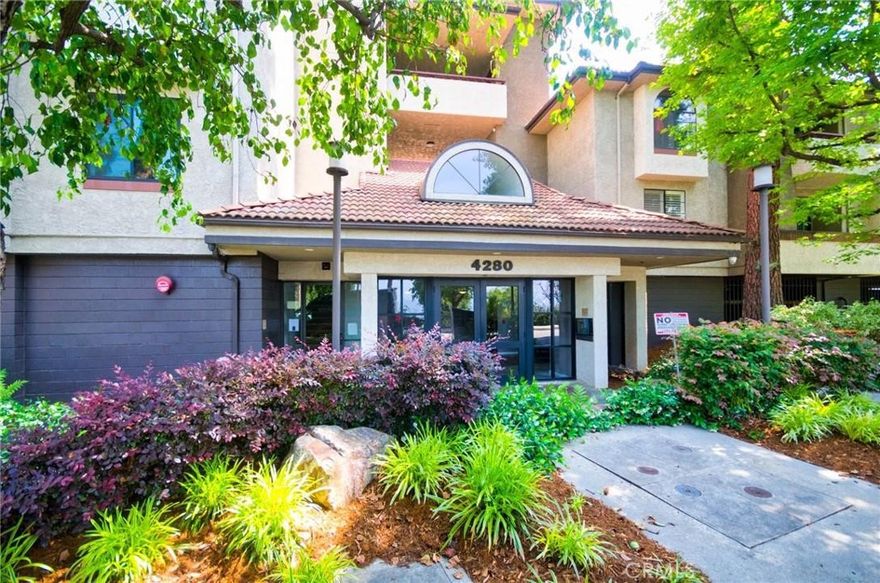 Welcome to your peaceful oasis in the highly sought-after Wilson Summit community—where comfort, style, and convenience come together. This spacious and cozy 2-bedroom, 2-bathroom condominium offers the perfect blend of urban access and serene living, just minutes from Downtown Los Angeles, Old Town Pasadena, and the USC Health Sciences Campus. Step into a spacious living room with a cozy fireplace. A sliding glass door opens to your own garden-view patio, the ideal spot to enjoy your morning coffee or unwind in the evening. The open and functional floor plan includes a wet bar, with fresh paint throughout. The bedrooms are both en-suites, each with its own good sized walk-in closet and brand new carpeting, offering privacy and plenty of storage. Additional conveniences include in-unit laundry with washer and dryer included, refrigerator, and two secured parking spaces—one equipped with an EV charger. The Wilson Summit community is known for its lush, landscaped courtyards, breezy walkways, and resort-style amenities including a pool, spa, and sauna. With secured entry and easy access to the Gold Line, fine dining, shopping, and vibrant city life, this home is a rare find in a prime location.