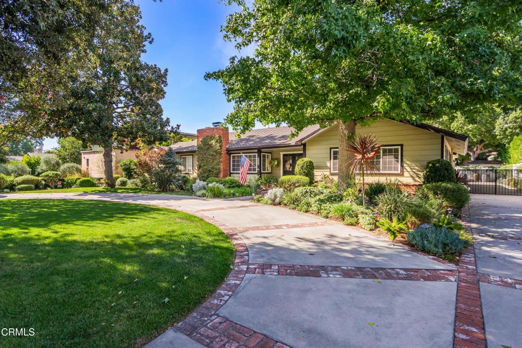 Welcome to this warm and inviting 4-bedroom, 3-bath ranch-style home nestled in the heart of Arcadia. Resting on an expansive 18,511 sq. ft. lot, it offers the perfect blend of comfort, functionality, and room to grow.Inside, enjoy 2,678 sq. ft. of living space, including a dining room anchored by a cozy fireplace--ideal for gatherings with family and friends. The primary suite is thoughtfully set apart from the other bedrooms, offering a private retreat within the home. The easy, open layout flows naturally to the outdoors, creating the ultimate entertainer's setting. The combination family room, kitchen has high ceilings and windows overlooking the incredible backyard.Step outside to your private retreat featuring a sparkling rock pool with cascading waterfall, bar area, and covered patio--perfect for summer parties, family celebrations, or quiet weekends by the water. The gorgeous landscaped grounds, long driveway, and undeniable curb appeal make this property as beautiful outside as it is inside. With such a generous lot, there's also incredible potential for an Accessory Dwelling Unit (ADU). This rare Arcadia gem combines spacious interiors, resort-style outdoor living, and endless possibilities--all in one of the city's most sought-after neighborhoods. Truly, an entertainer's dream home.
