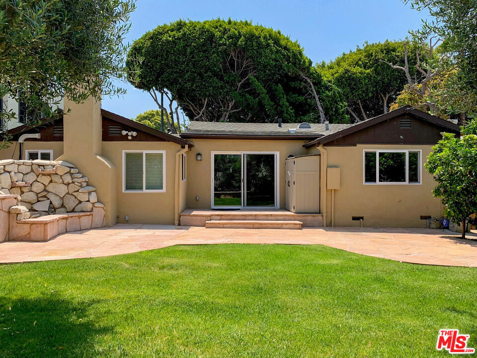 Beautifully renovated 3 bedroom/3 bath HOUSE with an open floor plan and a large backyard equipped with grille, fire pit and water fall. The backyard is filled with lot so fruit trees and a beautiful garden bed. The property is gated from the front and back. Unit comes with a two car garage with automatic doors. The interior is sun-filled with lots of windows, large open kitchen that flows into the living and dining space. If you are looking for an oasis in the middle of the City this is the home for you. The house has central AC, heat and washer dryer. Owner pays for water and trash.