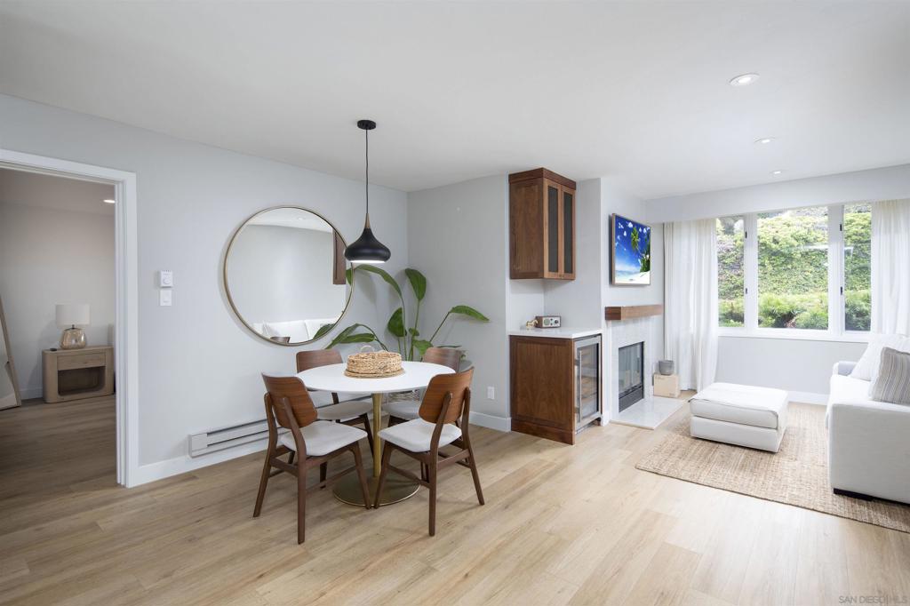 When you live at Chateau L’Auberge - you have full access to hotel amenities! Imagine waking up every morning living next to the award winning L’Auberge Hotel in Del Mar. You will be by the beach with full access to the gym, pool, jacuzzi and spa. This sounds like a dream vacation turned into a lifestyle! Our completely remodeled and upgraded 1 bedroom, 2 bath, main floor unit is the perfect place to call home! Sit by the fireplace and relax after a day at the beach. There is an in unit washer & dryer, Fisher & Paykel, Sub-Zero, Miele appliances and an adorable coffee bar! Our primary suite has a balcony and dedicated area for your desk for working remotely! Parking is easy with a reserved underground parking garage space and one exterior parking spot. You roll out of bed, slip into your comfy robe, and maybe head down to the hotel for a fresh smoothie or a luxurious breakfast with ocean views. Then it’s time to hit the gym. After your workout? A dip in the pool. Not just any pool — a pristine one with lounge chairs and chilled music playing in the background. Maybe you alternate between that and the jacuzzi, letting the jets melt your stress away while sipping something fruity. Evenings could be as relaxing or as lively as you want. Beach walks at sunset, cocktails at the hotel bar, or head into vibrant Del Mar Village and Plaza! Honestly, it’s like being in a permanent state of vacation! Don’t miss the hidden treasure of living in Del Mar - just one block to the beach and all the hotel amenities.