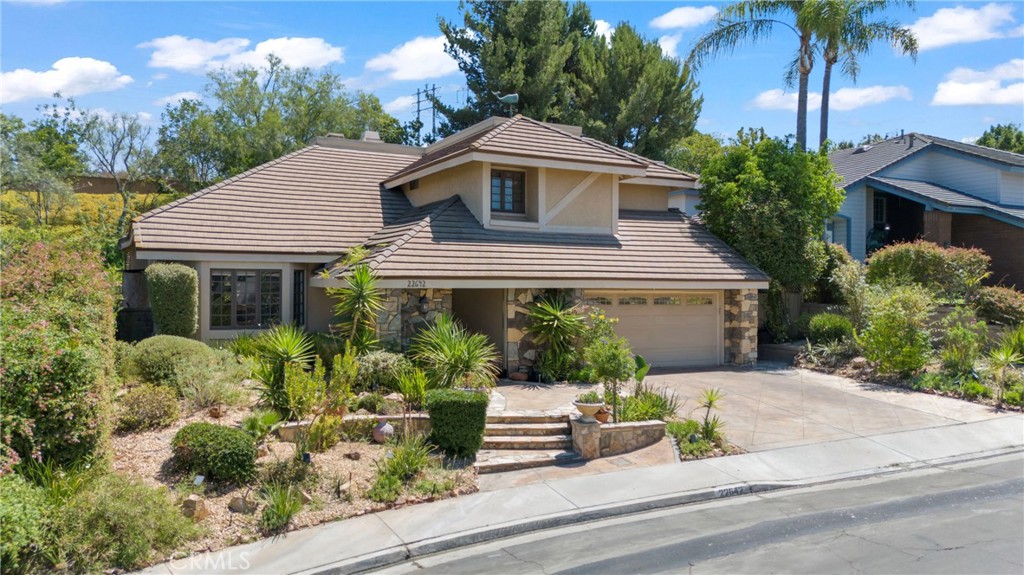 Beautiful and spacious single-family home with exclusive Lake Mission Viejo access. Offering over 2,700 sq. ft. of living space on a 6,300+ sq. ft. lot, this 3-bedroom, 2 ¾-bath home provides an abundance of space with flexible bonus areas that could easily be converted into a 4th bedroom.
Light, bright, and airy throughout, the home features accent details such as fireplaces, exposed wood beams, and coffered ceilings. The versatile floor plan includes a den, additional family room, wet bar with wine fridge, and French doors leading to a large covered backyard — perfect for entertaining. Flooring consists of stone, tile, and carpet, complementing the home’s open and inviting feel.
The upgraded kitchen and bathrooms add to the appeal, while the expansive primary suite is a standout with its own fireplace, exposed beam ceiling, private deck, and oversized en-suite bath with the potential for a stunning transformation.
Enjoy Lake Mission Viejo amenities and community events, along with nearby Florence Joyner Olympiad Park, outdoor recreation, dining, and shopping. Don’t miss this opportunity to own an impressive home in one of Mission Viejo’s most sought-after neighborhoods.