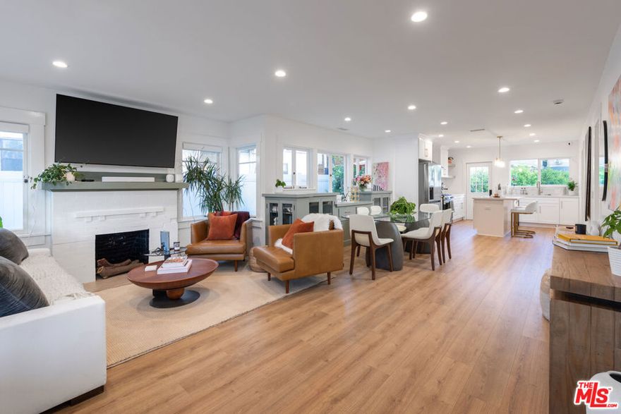 Incredible investment and income-producing bungalow with immediate income apx. 4% on the iconic Abbot Kinney Blvd, where modern luxury meets coastal charm. This 2-bedroom, 2-bathroom gem offers 1,283 sqft of meticulously upgraded living space. Every inch of this home was reimagined in 2023, featuring a brand-new kitchen, completely renovated bathrooms, an additional bathroom, new landscaping, exterior enhancements, updated electrical and plumbing systems, a new HVAC, and a new roof. The inviting interior boasts a stylish decorative fireplace, providing a cozy focal point for the living area. Outside, the property includes not only a backyard but also a 60 ft front yard and three private, coveted parking spaces. Also ideal for future developers, this property includes potential RTI plans for an impressive modern 3-story home. The design build promises 6,470 sqft of luxury living, with 5 bedrooms, 6.5 bathrooms, and an attached 1,200 sqft ADU. The ADU features 1 bedroom, 2 bathrooms, an office, and its own separate address. Situated close to Abbot Kinney's shops and renowned restaurants, this property offers diversity to own, live/work, or develop a multi-family residence in the center of Venice's vibrant lifestyle. Don't miss out on this exceptional property! The property is tenant occupied.