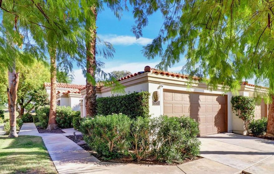 Enjoy the American Express PGA Golf Tournament from your patio with gorgeous golf course and mountain views overlooking the tee boxes on the 15th hole of the Stadium course! This nicely upgraded Champion 3 model offers 3 bedrooms and 2 bathrooms . The bright cheery kitchen has white cabinetry, granite countertops and stainless steel appliances. The living room features a gas log fireplace, a wet bar and vaulted ceilings give a spacious feeling. The main bedroom features a private patio, an upgraded vanity, a walk in shower and plenty of closet space!The front guest bedroom has double doors and can be used as a den, office, or a bedroom with a twin Murphy beds!! Newer tankless water heater and a HEPA air filter system has been added. Community pool and spa conveniently located across the street.  Don't wait! This is such a great opportunity to own in PGA West at a beautiful location on the world famous Stadium golf course!! Come by the Open House this weekend & see for yourself!
