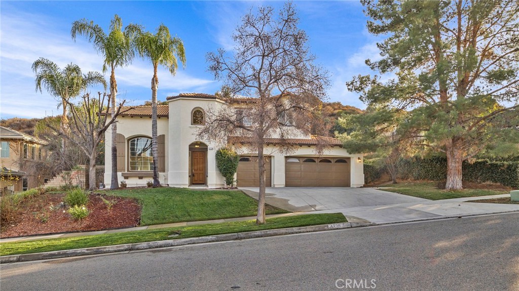 Step into this beautifully remodeled 4-bedroom 3-bath home offering 3351 square feet of exceptional living space. From the moment you arrive, you'll notice the fresh new exterior paint and inviting curb appeal. Inside soaring high-volume ceilings create a bright, open atmosphere, complemented by all new flooring throughout. The completely remodeled kitchen features sleek finishes, new stainless appliances with wi-fi connectivity, quartz counters, these sleek touches are perfect for everyday living and entertaining. Backyard is an entertainers dream with a sparkling rock pool and spa, a built in barbeque kitchen area, and plenty of space to relax or host gatherings. Whether you're unwinding in the spa, enjoying a swim, or dining al fresco, this home offers the perfect blend of indoor luxury and outdoor fun. With thoughtful upgrades throughout and a spacious, functional layout this property is a must see. The oversized downstairs bedroom and bathroom make this a perfect lay-out for next-gen living.