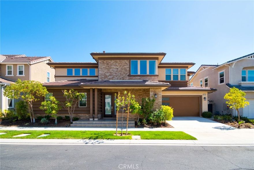 Nestled in the exclusive 24-hour guard-gated community of Altair Irvine, this stunning home offers 3 bedrooms, 2 full baths, 2 half baths, and a California room with a cozy fireplace. The spacious open-concept layout seamlessly connects the main living areas, while the California room—with its stackable slider doors—extends the living space outdoors, perfect for entertaining or relaxing. The home features a luxurious downstairs master suite and two additional bedrooms upstairs.Residents of Altair enjoy access to resort-style amenities, including sparkling pools and spas, a clubhouse, sports courts, playgrounds, and scenic walking trails. Conveniently located within the award-winning Irvine Unified School District, this home provides easy access to major freeways, shopping, and dining.