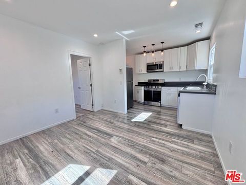 Photo of 3774 S Gramercy Place, Los Angeles, CA 90018 (MLS # 26651893)
