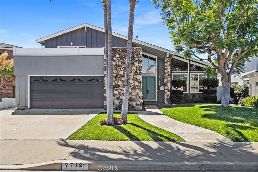 Nestled at the end of a tranquil cul-de-sac in the highly desirable Goldenwest Estates, this property has been meticulously maintained and owned by the same family for generations, a true testament to pride of ownership. Offering incredible flexibility, this split-level floor plan is designed with two separate living areas: the upper level features three bedrooms and two bathrooms, while the lower level includes a private one-bedroom, one-bath suite with its own family room - perfect for multi-generational living, long-term guests, or work-from-home needs. Step through the double-door entry into welcoming oversized living spaces for gracious living. The home’s southern exposure fills each room with so much natural light. The charming kitchen will become the hub of the home as it is adjacent to the convenient breakfast nook and the large family dining space. The primary suite is well sized and has a walk-in closet and attached fully remodeled bathroom while a private attached balcony deck spanning over 75% of the garage creates the perfect setting for outdoor relaxation or entertaining. Two additional upstairs bedrooms complete the spaces and one of those bedrooms includes an alcove and hidden walk-in cubby. Recent upgrades ensure peace of mind, including a PEX repipe (2020), new sliding screen doors within the primary and family room (2020), new kitchen faucet (2020), custom blinds for the kitchen and family room (still in box), and fresh paint and carpet throughout. (2025) Additional features include a new garbage disposal, Chamberlain LiftMaster garage door opener, and interior tract location that maximizes privacy. Your backyard will become your own personal paradise. Generously sized with a covered outdoor room, grape vine, persimmon tree, mature landscaping and a grassy area perfect for family fun or pets! Best of all, this home comes with no HOA! Situated minutes from the vibrancy of Little Saigon, Bella Terra, and beaches, this location combines convenience with serene lifestyle living. Homes of this size, quality, and location rarely become available. Don’t miss your chance to make this versatile and beautifully maintained property yours!