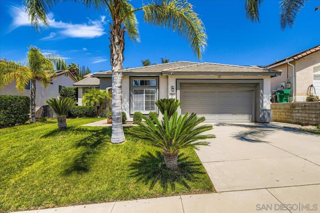 HIGHLY UPGRADED SINGLE-STORY HOME | NO HOA | LOW TAXES | PRIME LOCATION Welcome to this stunning detached single-story home ideally located on the Temecula-Murrieta border! Boasting 1,942 sq ft of beautifully designed living space, this home offers 4 spacious bedrooms, a dedicated office space, and 2 recently upgraded bathrooms featuring dual sink vanities and new flooring. Step through the charming Dutch door entrance into a light-filled formal living room with soaring vaulted ceilings. The open floor plan flows seamlessly into the gourmet kitchen, complete with upgraded cabinetry, an ENORMOUS quartz center island, quartz countertops, designer tile backsplash, stainless-steel appliances, and ample built-in storage. The kitchen opens to the cozy family room featuring an upgraded fireplace and custom built-in TV/media wall unit—perfect for relaxing or entertaining. Outside, enjoy a private backyard with fruit-bearing trees, ideal for gardening or outdoor gatherings. Additional highlights include a 2-car garage, solar panels for energy efficiency, and no HOA. Centrally located just minutes from Harveston Lake, Temecula Wine Country, the Promenade Mall, local parks, and within the highly acclaimed Murrieta Valley School District. Commuters will appreciate easy access to both the 215 and 15 freeways. Don’t miss this rare opportunity to own a truly turnkey home in one of the most desirable areas in the Inland Empire!