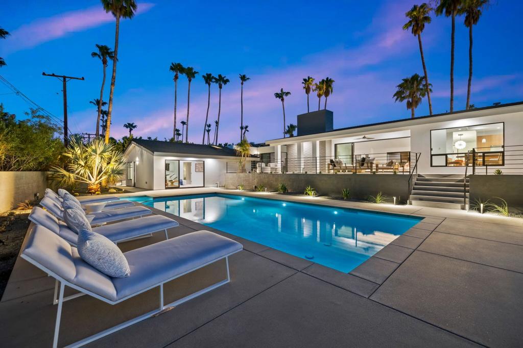 Welcome to South Palm Desert. Walking distance or a golf cart ride to the Desert's hottest entertainment/restaurant/shopping corridor - ''El Paseo.'' Situated in one of the most sought-after locations, this home seamlessly blends an exceptional setting with a thoughtfully designed estate home. The home boasts the following key features: 3,796 SF, 4 bedrooms and 5 bathrooms, casita/pool house, 5 - car collector garage, RV parking & large motor court. This home took hours of planning, permitting, and executing in order to achieve the perfect contemporary living experience in South Palm Desert. Upon entering the residence, you will see the open floor plan that feels airy and inviting. Next, the rear portion of the home features a custom stackable glass slider to capture the entertainer's backyard with a 40 ft pool, built in firepit, built in BBQ, and modern landscaping and hardscape. Vaulted/high ceilings throughout the home and large format picture frame windows that bring in great natural light. The kitchen features a large center island, custom cabinets, built in brand new Thermador appliances. Big bonus is a true casita/pool house perfect for extended family or guests to enjoy with a full kitchenette, bedroom, and living room. Other notable features new windows and sliders, smooth drywall, new concrete hardscape and landscape, smooth exterior stucco, epoxy garage floor, custom walk-in showers, custom interior doors, recessed built in LED lighting throughout entire home, custom closet build outs, LED ceiling lights, and solar. Enjoy the professional pictures, but an in-person visit will not disappoint you.