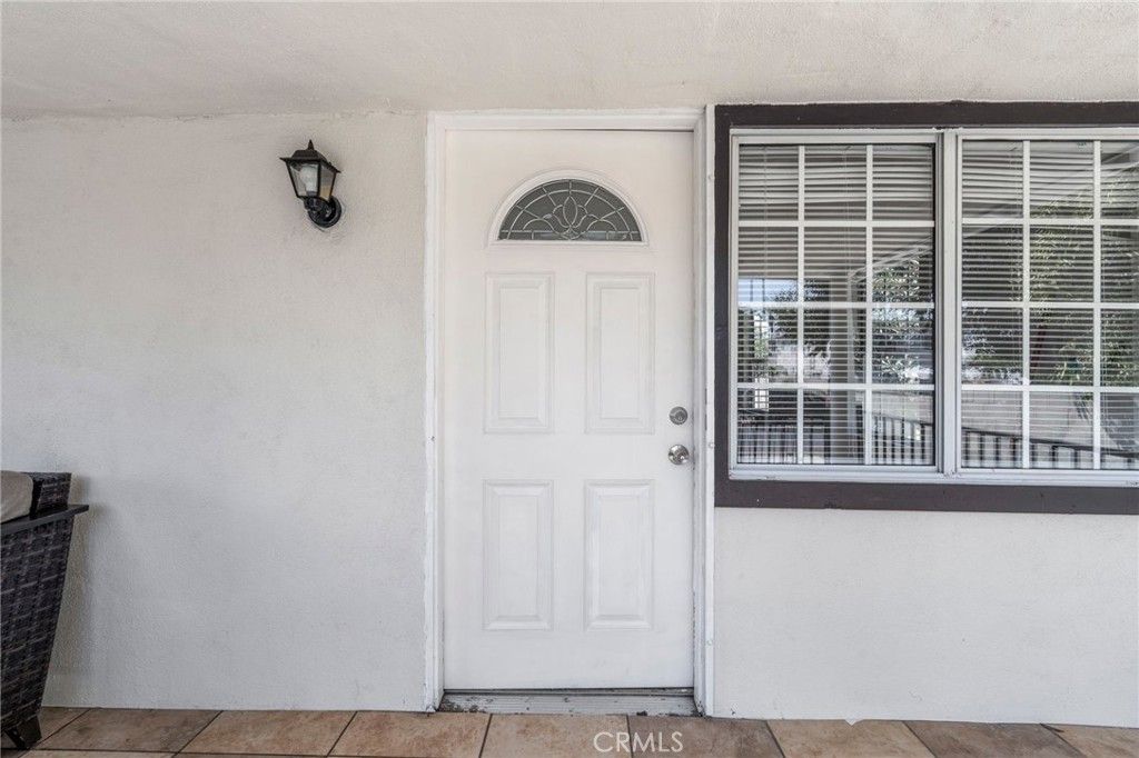 Photo of 1545 E 41st Pl, Los Angeles, CA 90011 (MLS # WS25243969)