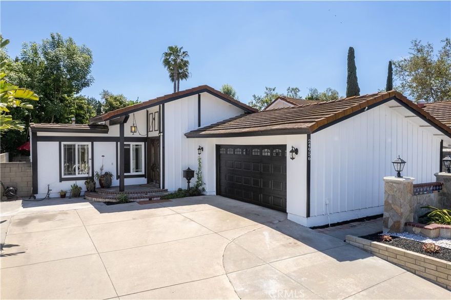 If you’ve been dreaming of a beautiful home in a premier Laguna Hills location, this could be the one for you. Ideally situated only minutes from Highway 5 for quick and easy commuting, this property showcases meticulous attention to detail and true pride of ownership. The entrance, main living area, and kitchen feature soaring ceilings and abundant natural sunlight, creating an inviting and open feel from the moment you step inside.
The home has been thoughtfully upgraded, including new luxury vinyl plank flooring in all bedrooms, newer double-pane windows, a newer stackable washer and dryer, and completely remodeled bathrooms with modern, high-end finishes.
The kitchen is a true centerpiece, highlighted by a large waterfall island, elegant quartz countertops with matching backsplash, and a stunning farmhouse sink. It’s equipped with high-end GE Smart Cafe appliances, including a double oven range, microwave with a built-in air fryer, double drawer dishwasher, and a smart refrigerator that even dispenses hot water.
The backyard offers exceptional space. It is large, private, low-maintenance and enhanced by fruit trees such as lime, lemon, fig, and persimmon, making it perfect for outdoor enjoyment without the upkeep.
With no HOA, no Mello-Roos, and a low tax rate, this neighborhood offers incredible flexibility and value. Top-rated schools, Starbucks, and major shopping centers are just a short drive away. Please note the furniture shown in the pictures is virtually staged.