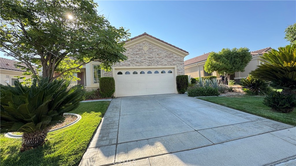 Beautifully Upgraded Model in Solera Del Webb 55+ Gated Community
Welcome to this stunning, move-in ready home nestled within the master-planned, gated Solera Del Webb 55+ community in Beaumont. Thoughtfully upgraded and impeccably maintained, this residence offers the perfect blend of comfort, style, and active adult living.
Step inside to discover an open-concept floor plan designed for effortless entertaining and everyday enjoyment. The spacious great room flows seamlessly into the dining area and kitchen, all enhanced by rich bamboo wood flooring, recessed lighting, and soaring 10-foot ceilings. A cozy fireplace anchors the family room, while large windows throughout bathe the home in natural light.
The covered lanai patio invites you to relax or host guests while embracing the indoor-outdoor California lifestyle. The expansive primary suite features a luxurious bathroom, oversized walk-in closet, and serene privacy. A well-appointed guest bedroom and bath are located at the front of the home, along with a versatile double-door bonus room—ideal for a home office, craft space, or media retreat.
Additional upgrades include:
• Tile flooring in the entry, bathrooms, and laundry room
• Warm, neutral interior paint for easy decorating
• Spacious kitchen with ample cabinetry and natural flow
Prime Location with Small-Town Charm and Big-Time Convenience
Located in the growing city of Beaumont, this home offers quick access to local grocery stores, dining, and shopping—all with a welcoming small-town feel. You're just minutes from the Cabazon Outlets, Palm Springs, Redlands, and the charming mountain towns of Oak Glen and Cherry Valley, perfect for hiking and seasonal fruit picking.
Resort-Style Amenities for Active Living
Solera Del Webb offers an exceptional array of amenities to enrich your lifestyle:
• Golf course
• Tennis, pickleball, and bocce ball courts
• Pool and jacuzzi spa
• Fitness center and walking trails
• Clubhouse with fireplace lounge, billiards room, catering kitchen, and library
• Outdoor BBQ and picnic areas
• A vibrant community center hosting clubs, events, and social activities
Don’t miss your chance to experience this beautiful home and the incredible lifestyle that comes with it. Schedule your private tour today!