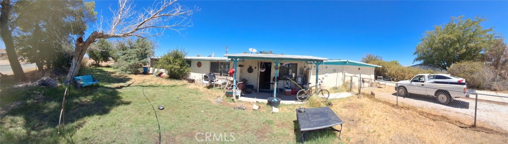 Investors here's your opportunity to own a home with a 2 car garage and a huge workshop or detached garage. A huge 23,522 sq ft lot. More photos coming tomorrow. Lockbox on tomorrow.