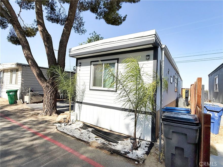 Step into this beautifully cared-for mobile home located at 45415 28th Street East, Space 64, in the welcoming community of Sunny Skies Mobile Home Park, Lancaster, CA 93535. With a thoughtfully designed living space, this home shines with evident pride of ownership. Over the years, it has seen several tasteful upgrades, including updated flooring, and wall mounted AC to keep you comfortable year-round.



The updated kitchen offers a warm and functional space with sleek quartz countertops and a built-in gas cooktop great for both daily meals and weekend gatherings. You’ll also appreciate in unit laundry hook ups. Step outside to enjoy the large side yard—perfect for kids, pets, or just unwinding in the fresh air. Don't miss your chance to call this stylish mobile home your new home!