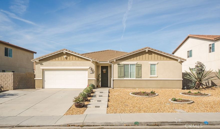 Welcome to 11661 Forsythia! This beautiful 4-bedroom, 3-bath single-story home in a highly desirable Jurupa Valley neighborhood! Built in 2018, this spacious 2,475 sq ft home features an open-concept layout, wide-plank laminate flooring, recessed lighting, and a modern kitchen with a large island and stainless-steel appliances. The primary suite offers excellent privacy, and all bedrooms are generously sized.
Enjoy low-maintenance living with a 6,969 sq ft lot, drought-friendly front yard, covered patio, newer tankless water heater, and energy-efficient solar.
Located walking distance to Del Sol Academy (K–8) and Esplanade Park, this move-in-ready home blends comfort, convenience, and a fantastic community setting.