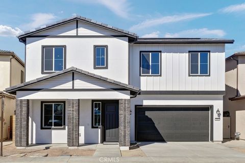 Photo of 114 Pansy, Irvine, CA 92618 (MLS # IG25219861)