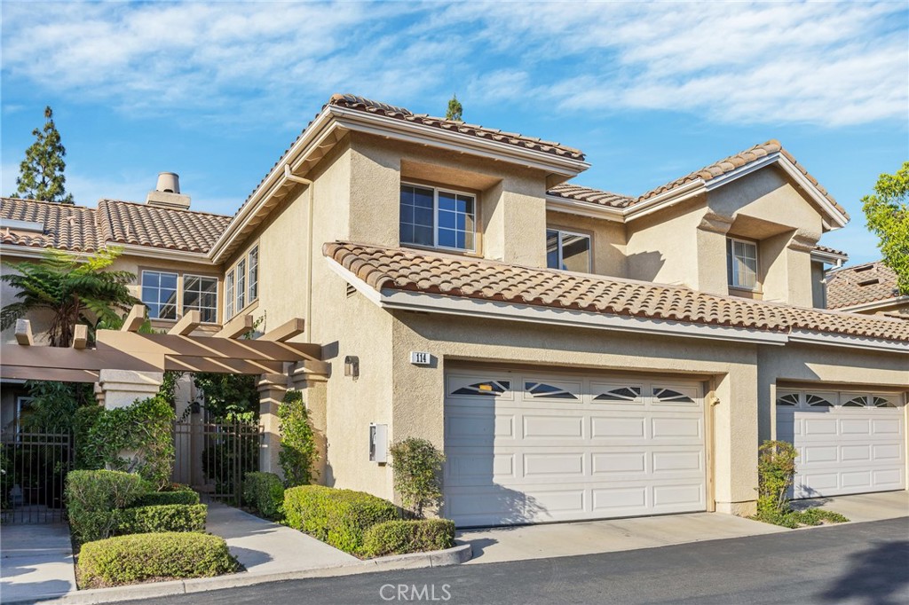 Welcome to 114 Encantado Canyon. Beautifully upgraded 3-bedroom, 2.5-bath townhome with a 2-car garage, located in a highly desirable resort-style community of Belterraza featuring a sparkling community pool, relaxing spa, and beautifully maintained common areas—all overseen by a financially responsible HOA. The home features a low-maintenance backyard with Saltillo tiles, covered patio with drought-tolerant landscaping, ideal for effortless outdoor living. Inside, enjoy a fully remodeled kitchen with quartz countertops, brand-new cabinetry, new stainless steel appliances, new recessed lighting, and updated switches throughout. All bathrooms have been tastefully renovated with quartz countertops, modern cabinetry, stylish mirrors, and upgraded lighting. The primary suite is a true retreat, complete with a private balcony and a sun-filled en-suite bathroom with a skylight. With quality upgrades throughout and the peace of mind that comes from a well-managed, financially sound HOA, this turnkey townhome is the perfect blend of comfort, style, and low-maintenance living. Rancho Santa Margarita residents enjoy the beautiful RSM lake, beach club, 13 community parks, playgrounds, community pools, sports courts, hiking and biking trails. Just a few minutes away from O’Neill Regional Park. Nearby top rated schools and easy access to the 241 Foothill Transportation Corridor.