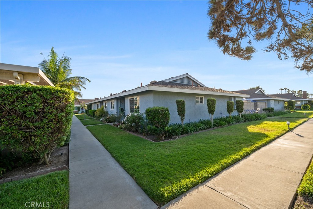 Welcome to 1076 Mitchell Avenue, a charming and lovingly cared-for end-unit condo in a quiet, gated community in Tustin. This 2-bedroom home offers a peaceful lifestyle with only one shared wall, a private outdoor patio, and a detached 2-car garage—perfect for parking and extra storage. Recent upgrades include beautifully updated bathrooms, while the thoughtful layout and natural light make the space feel warm and inviting. Enjoy access to the community pool, all while being conveniently close to major freeways, shopping, and dining—without sacrificing peace and quiet. Whether you're a first-time buyer or looking to downsize into something low-maintenance and move-in ready, this home offers the ideal blend of comfort, privacy, and convenience.