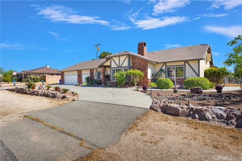 Photo of 19985 Red Feather Rd, Apple Valley, CA 92307 (MLS # HD26080686)