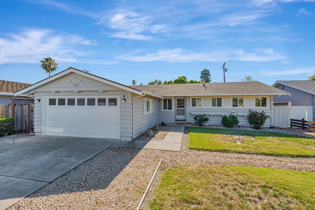 Step into comfort and convenience with this beautifully maintained 4-bedroom, 2-bath home in one of Santa Claras most desirable neighborhoods. Move-in ready with fresh interior/exterior paint, central heating and A/C, double-pane windows, and refinished hardwood floors. The entire home has been fully rewired with upgraded electrical panels, and the garage includes an EV plug for modern living. Enjoy a cozy living room with a Gas-burning fireplace and sliding glass doors leading to a spacious covered patio great for entertaining. A separate family room, closet lighting, and a newer sewer line add functionality and peace of mind. Located in the award-winning Cupertino school district (Eisenhower Elementary, Hyde Middle, Cupertino High) with low Santa Clara utilities and quick access to highways, Apple, Nvidia, Kaiser, Levis Stadium, and more. The perfect blend of location, comfort, and convenience!