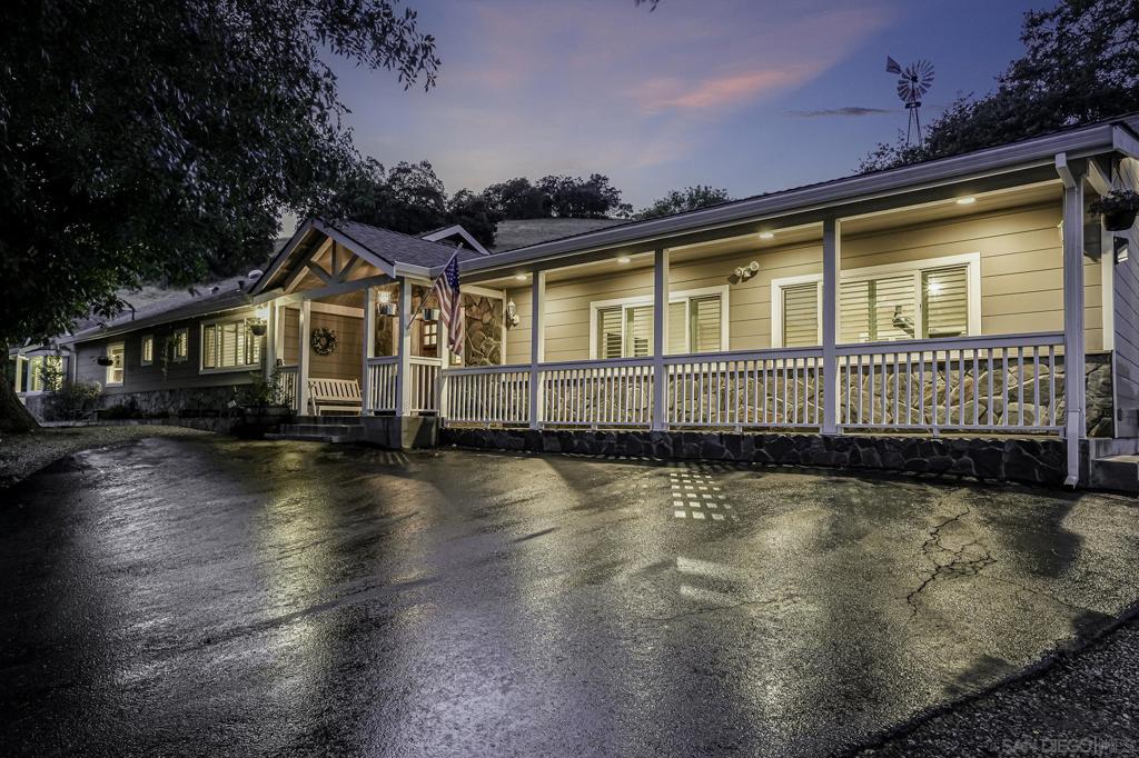 Set on 2 private acres in the scenic hills of Paradise Valley, this ranch-style retreat offers the tranquility of the countryside with convenient access to vibrant downtown Morgan Hill. The 4-bedroom, 2-bathroom home features over 2,750 sq ft with a remodeled kitchen, updated bathrooms, fresh paint, and energy-efficient upgrades including solar and double-paned windows. A spacious covered patio extends living outdoors, while a detached 3-car garage with workshop space adds flexibility. The property also includes animal corrals within a fenced pasture, ideal for hobby farming or livestock. With no HOA, a private well, septic, and a peaceful backdrop of rolling hills, this is a rare opportunity for countryside living near city amenities. 1755 W Edmundson is the address listed on the Tax Roll. 1755 Paradise View Rd is the physical address of the property that can be found via your GPS. - Detached 3-car garage (added in 2008) - 500 sq ft addition (2008 remodel) - Roof pitch changed from 4/12 to 5/12 - Electrical upgraded from knob & tube to Romex - New main and sub electrical panels - Plumbing upgraded to copper - High-efficiency interior and exterior lighting - Home rebuilt in 2018 after full interior gut (post-2015 fire) - New insulation installed throughout (asbestos removed) - Septic system serviced in 2024 - Dual risers with lids installed in 2019 - Dual gate added to leach field - 36 ground-mounted leased solar panels (installed 2014) - 25 garage-mounted leased solar panels (installed 2015) - Two Tesla Powerwalls (installed 2025) - EV charging station at garage - Three wells on property (one with working windmill) - Two 2,500-gallon water tanks behind house - Two 5,000-gallon water tanks next to garage - Redwood deck with 4,000-gallon rainwater cistern beneath - Fruit trees: Plum, Apricot, Apple, Orange - Mature Live Oak, Deciduous, and Scrub Oak trees - Decorative and drought-tolerant landscaping - Pavilion with ceiling fan and propane fire pit - Concrete slab with electrical for future jacuzzi - RV parking near pavilion - ¼ acre fenced pasture with Polyvinyl fencing - Dual metal gates at both ends of pasture - Two run-in sheds - Two Tuff Sheds for additional storage - Flag pole with solar-powered light