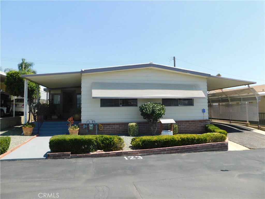 ~Gorgeous home in Banning’s highly desirable 55+ community, Sunrise Estates!~Pride of ownership shows throughout!~Recent upgrades include re-coated metal roof in 2024, new water heater in 2024, new HVAC system in 2020, freshly painted exterior in 2025, and new vinyl flooring in kitchen, both bathrooms, and guest bedroom in 2023 and 2024!~HUGE bright living room!~Updated kitchen with new gas cooktop, stainless steel sink, new dishwasher, breakfast bar, and plenty of storage space with new cabinet handles!~Fridge included!~Separate family room with China Hutch, ceiling fan, and sliding glass doors to California room perfect for office, hobby room or gym!~Primary bedroom is king size offering plenty of storage space with full size closet plus built-ins!~Primary bath with beautifully upgraded vanity, walk-in shower with enclosure, and separate garden tub!~2nd bedroom is queen size with built-ins with adjoining guest bathroom!~2nd bathroom with new walk-in shower with enclosure, plus updated vanity!~Separate laundry room with included washer/dryer!~Brinks security system included!~Beautifully maintained backyard with orange and lemon tree, plenty of privacy with backyard brick wall, and concrete back patio!~2 sheds included!~Carport with extenders can fit 2-3 vehicles!~Beautifully maintained front yard and concrete front patio offers great curb appeal and beautiful views of surrounding area!~Call for a tour today, you will definitely be impressed!~