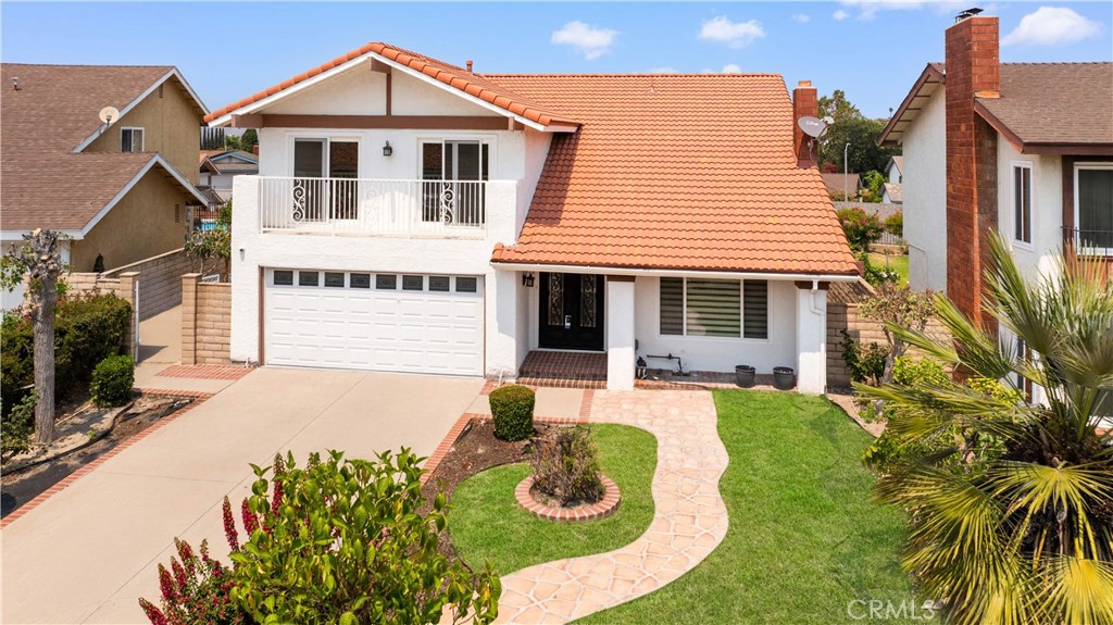 Welcome to your dream home in the heart of Diamond Bar! Nestled in a quiet cul-de-sac, this beautifully maintained residence offers 2,324 square feet of comfortable living space on a generous 6,808 square foot lot.
Step inside to find a well-designed layout featuring a convenient downstairs bedroom plus a versatile bonus room—perfect for a home office, guest room, or playroom. Upstairs, you’ll find the remaining spacious bedrooms, ideal for privacy and family living.
The backyard is an entertainer’s paradise, boasting a sparkling pool with stunning mountain views, a perfect setting for relaxing summer days or weekend gatherings.
Enjoy the prime location with quick access to top-rated schools, grocery stores, shopping centers, and a variety of local dining options, all just minutes away. Additional highlights include a two-car garage, ample driveway parking, and a peaceful neighborhood feel.
Don't miss this rare opportunity to own a spacious, well-appointed home in one of Diamond Bar’s most desirable neighborhoods!