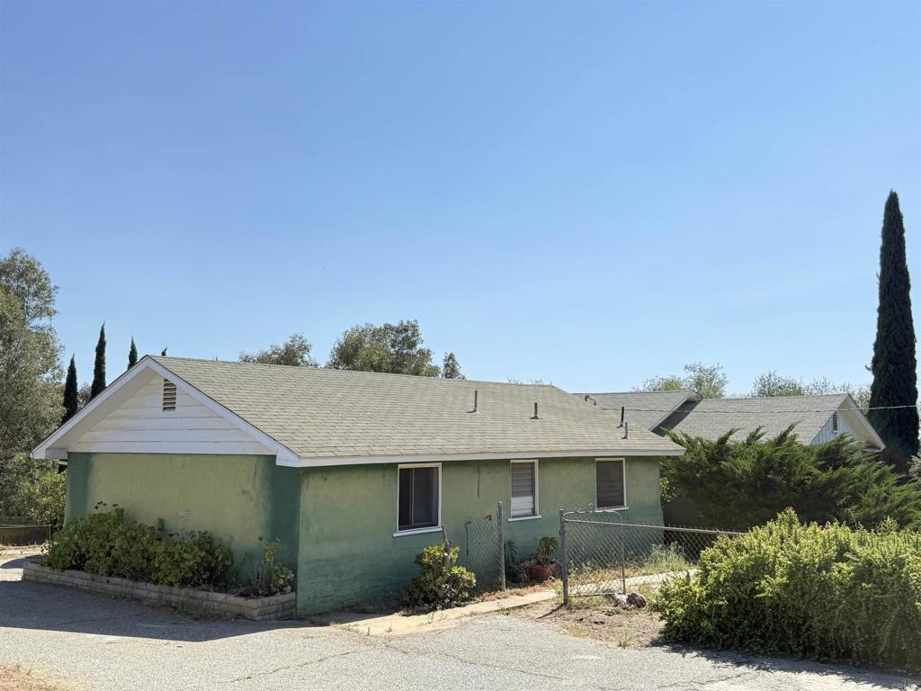 Discover the charm and character of this mid-century home situated on a spacious over half-acre lot in the heart of Fallbrook. Featuring 4 bedrooms, 3 bathrooms, and 1,807 sq. ft., this property showcases classic architectural details, original hardwood floors, and unique period features that make it a true gem for those who appreciate timeless design. This is an incredible opportunity to renovate and restore a home with great bones into your dream retreat. With its generous lot size and desirable location, the possibilities for creating a modern masterpiece while preserving its vintage appeal are endless. Bring your hardhats this is a renovation project.