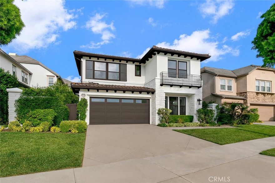 Located within the prestigious gated community of Campobello, this beautifully upgraded residence is being offered for the first time since its original construction and offers an ideal blend of space, comfort, and coastal charm. Spanning approximately 2,762 square feet, the home makes a striking first impression with soaring 18-foot ceilings and an abundance of natural light. The open-concept layout flows effortlessly from the formal living room to the dining area, while the updated kitchen, with quartzite natural stone counters, a Wolf cooktop, double ovens, stainless steel appliances, and soft-close cabinetry, opens to a spacious family room with a cozy fireplace, perfect for everyday living and entertaining. The backyard is equally inviting, featuring a built-in BBQ area and ample space to relax or gather with friends. A desirable main-level bedroom with French doors opens to the gated front patio, perfect as a guest suite, home office, or multi-generational space. Upstairs, three generously sized bedrooms include a luxurious Master/primary suite with a spa-inspired bath featuring a standalone soaking tub, separate shower, and a large walk-in closet. The two upstairs secondary bedrooms and the downstairs bedroom enjoy corridor, peek-ocean, and city light views. Additional highlights include quartz countertops in the bathrooms, custom tile work, and access to Campobello’s private pool and spa. Residents also enjoy Newport Coast Master Association amenities, including a Junior Olympic pool, spa, clubhouse, BBQ areas, tennis, pickleball, basketball courts, and expansive parks and playgrounds. Moments to 1,000s of acres of CA state protected land with scenic hiking and biking trails, sports park, Fashion Island, freeway access, award willing schools, and world class beaches, live the good life that Newport Coast has to offer.