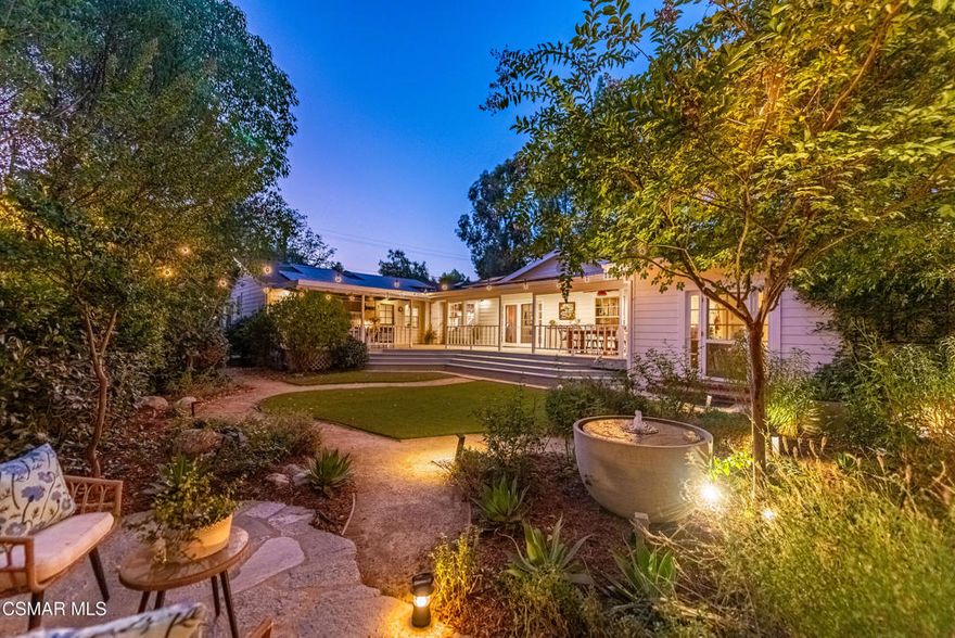 Nearly impossible to find, this private, gated estate in charming Old Agoura offers a rare blend of refined living and country charm. Set on 1.5 acres of flat land, the property features a sprawling single-story 4,050 sq ft main residence paired with a generous 1,190 sq ft single-level guest house. From the moment you arrive, the home exudes warm sophistication. Wide hickory floors anchor inviting living spaces, while the chef's kitchen--appointed with Wolf and Sub-Zero appliances--flows into a covered back porch overlooking a serene English garden. The versatile floor plan offers room for every chapter of life: a richly designed library/media room, a cheerful playroom near the kitchen, a private guest suite with its own bath, and even a walk-in wine closet for your collection. The primary suite is a true sanctuary, complete with dual bathrooms, dual walk-in closets, and an adjoining flex space ideal for a nursery or home office. Life here embraces a simpler rhythm without compromising luxury. Sip coffee while gathering eggs from your hens, enjoy supper on the porch, then linger by the firepit under a blanket of stars. The cedar-and-steel 4-stall barn offers endless possibilities--boarding horses, goats, or minis--or simply use it as versatile space for hobbies and storage. With an extra wide driveway leading to the back of the property, there's plenty of room for an RV, boat and trailers. While private and serene, the home is only minutes to local shopping, dining, award-winning Las Virgenes schools, and a 4,000-acre park--where hiking, cycling, and horseback riding await. With 6 bedrooms, 6.5 bathrooms, and two distinct single-story residences, this property is uniquely valuable and quite a find in today's market. Note the 1,190 sq ft guest house is a permitted structure, per seller (not permitted as an ADU or Guest House) and the parcel is 1.47 acres.