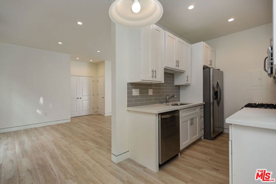 Residence 103 is an open studio + 1 bath apartment in the trendy Melrose District/ West Hollywood area! There is STREET PARKING ONLY for this building but it is a parking permit district so residents can obtain parking permits and guest passes with the city.  Walking distance to Sprouts, Target, shopping mall, Poinsettia Park, and Melrose Ave with an array of shops and restaurants. Located inside a small, quiet, and secured building with gorgeous natural lighting and secure intercom controlled entry. The following in-home features include: * Stainless Steel Whirlpool appliances including microwave, stove, and refrigerator * Washer and Dryer IN UNIT * Air Conditioning and Heating * Wood  Flooring * Recessed Lighting. This beautiful apartment is located inside a 16 unit complex with secured entry. Pet welcome for an additional deposit. Call to inquire today!