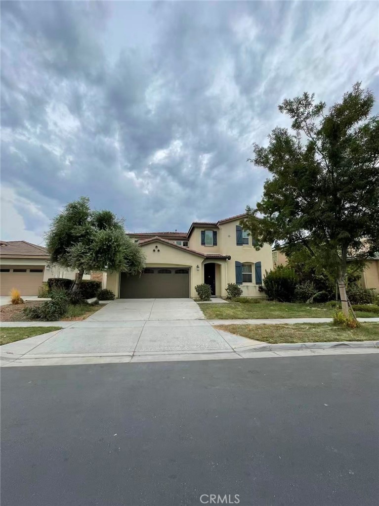 This beautiful single-family home in the Rancho Cucamonga neighborhood features brand new carpet and hard floor. Built in 2016, the home spans 2809 sqft and boasts four bedrooms and three bathrooms. Conveniently located near the 15 and 10 freeways, floor-to-ceiling windows create a bright and welcoming atmosphere. The open floor plan is perfect for gatherings and entertaining! The kitchen is a chef's paradise, featuring beautifully upgraded granite countertops and stainless steel appliances, including a stove, oven, and microwave. A center island provides space for casual dining. The spacious living room features a fireplace. A guest suite is located on the first floor. The pool and clubhouse are just next door.