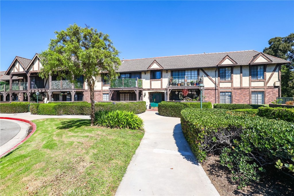 Welcome to this stunning 2-bedroom, 2-bathroom condo located in Santa Ana. This property is nestled within a gated community, offering an extra layer of security and peace of mind. The condo boasts a range of amenities designed to enhance your living experience. Enjoy the convenience of in-unit laundry. The community pool and gym are perfect for those who value fitness and leisure, providing a space to unwind and stay active. The condo is situated in a Tudor-style building, adding a touch of historical charm to the modern comforts within. An enclosed patio offers a private outdoor space for relaxation or entertaining, while the view of the man-made lake and fountain adds a serene backdrop to your home. The greenbelt surrounding the community provides a lush, tranquil environment, perfect for leisurely strolls. Experience the perfect blend of comfort, convenience, and style in this Santa Ana condo.