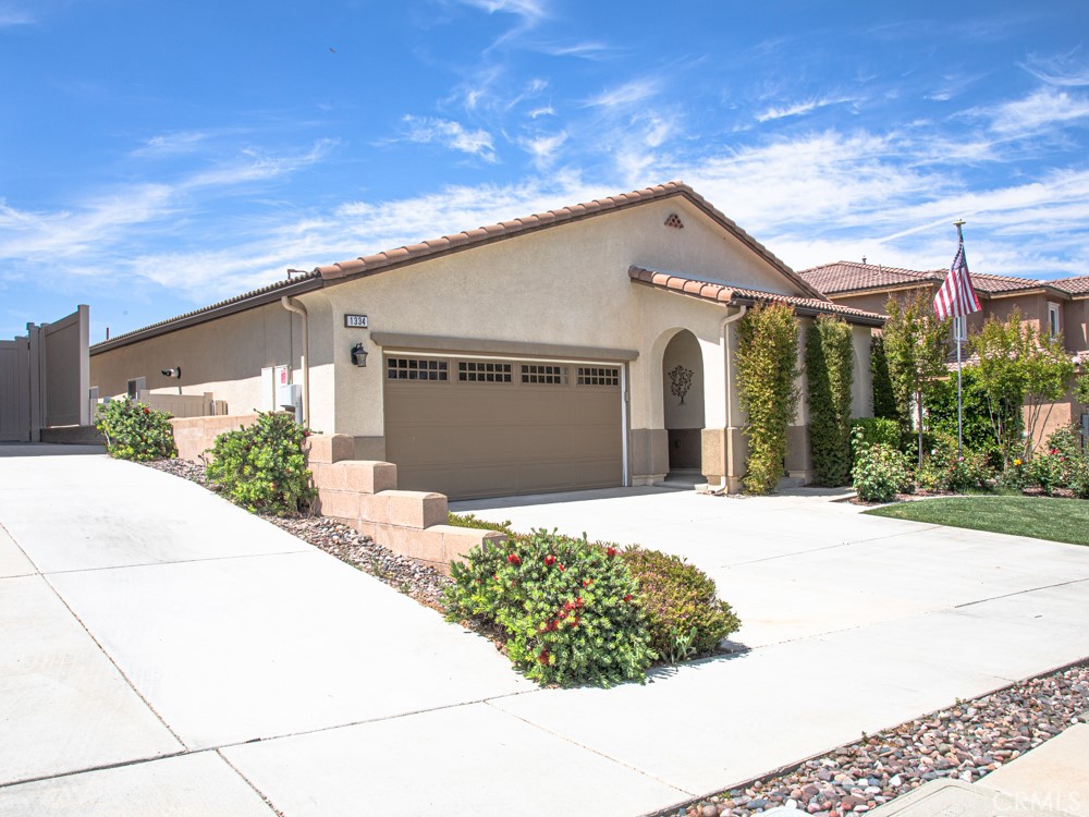 RED HOT Summer Pricing with OWNED SOLAR to KEEP YOU COOL! Welcome Home to 1334 Pinehurst Drive in Calimesa's desirable gated community of JP Ranch! Turnkey single-story home with an open concept floorplan which features a great room with kitchen, dining and living space combined. Enjoy 4 spacious bedrooms PLUS a large office, den, formal dining room or even a 5th bedroom option - your choice. Fresh interior paint and vinyl flooring in inviting neutral colors. Soft water system and reverse osmosis too! There are 17 solar panels on the roof and they are PAID for! You own it! (628 kWh generated last billing cycle/see supplements) Coupled with LED lights and plantation shutters throughout, say goodbye to high electric bills! Full length covered patio is perfect for entertaining. Mature landscaping beautifully adorn both front and rear yards. There's even a storage shed for tools! JP Ranch's gated community offers a pool, spa, clubhouse, BBQ areas, playground, sports courts, dog parks, trails, and abundant greenspace to explore. This home is conveniently located with plentiful parking across the street, too. Your new home is a great place to gather!
