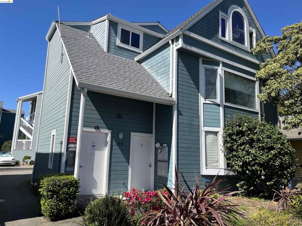 Welcome to this stunning, spacious, and light-filled 2-bedroom, 1-bathroom condo, ideally located just west of Berkeley's Poet's Corner and south of the Ocean View District. This charming home is just blocks from the vibrant 4th Street shopping district and opposite University Avenue. The desirable location is only the beginning. Step inside to discover an ideal floor plan that offers a perfect blend of comfort and style. The updated kitchen, featuring sleek stainless steel appliances, seamlessly opens into a large living and dining area, highlighted by a picturesque window—perfect for effortless entertaining. As you move toward the quieter rear portion of the unit, you'll find two generously sized bedrooms. Each room is perfectly positioned to receive abundant natural light through the windows and offers ample closet space. The common area yard behind the building, located past the unit's carport space, is perfect for hosting larger gatherings. Convenience is key here, with quick access to Aquatic Park, downtown Berkeley, UC Berkeley, shops, cafes, and major transit options including freeway, bus, and BART. Experience the unparalleled lifestyle of this home with its impressive "97 Walker's Paradise" and "96 Biker's Paradise" scores. This is more than just a condo; it's your