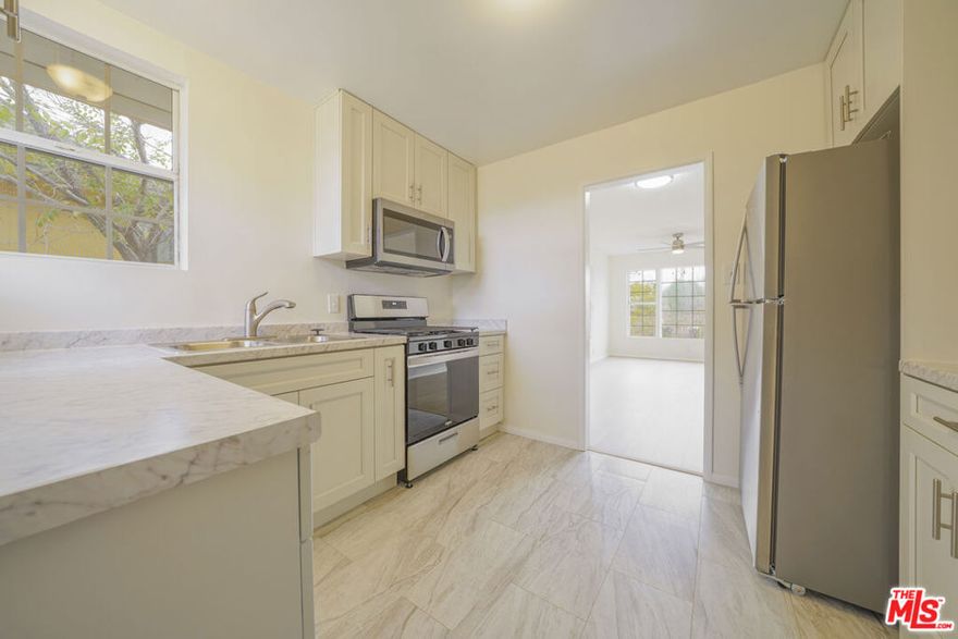 This fully renovated, move-in ready home sits on a prime R3-zoned lot, offering exceptional potential for owner-users, investors, and developers alike. The cozy interior provides immediate comfort, while the R3 zoning opens the door to multi-family development, making it an ideal opportunity for long-term growth. Whether you're looking for a home to settle in or a property with exciting redevelopment potential, this is a rare find that combines livability with future possibilities.