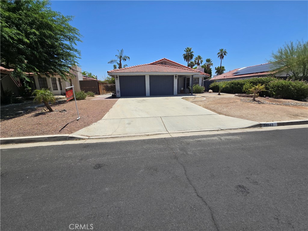 Desert Oasis with Pool, Spa & Solar – A Vacation Feel at Home!
This charming home offers the perfect getaway vibe—every day will feel like a vacation! Designed for comfort and easy living, the low-maintenance landscaping in both the front and back yards makes upkeep a breeze. Inside, you'll find four generously sized bedrooms, each featuring laminate wood flooring and sliding closet doors. The home includes three full bathrooms with modern tile flooring, updated shower heads, and dual sinks—perfect for families or guests. The open-concept kitchen is bright and spacious, complete with French doors that lead to a covered patio, ideal for indoor-outdoor living. Just off the kitchen is a large laundry room with ample shelving—it can even double as a pantry! Enjoy relaxing evenings in the cozy living room with a fireplace, or step outside to your private backyard retreat featuring a sizable pool and spa—furnished, low-maintenance, and ready for entertainment or peaceful relaxation. The converted two-car garage serves as an additional bedroom with central air and heat and a fully updated bathroom—beautifully done and perfect for guests or extended family. There is still one interior garage space for parking or storage, plus a driveway that accommodates up to three vehicles. Set in a vibrant yet tranquil community surrounded by stunning mountain views, this home is perfect for those who love desert living. It's close to local shopping centers, schools within walking distance, and has easy access to the 10 Freeway for commuters. Golf courses and other recreational amenities are also nearby for your enjoyment.