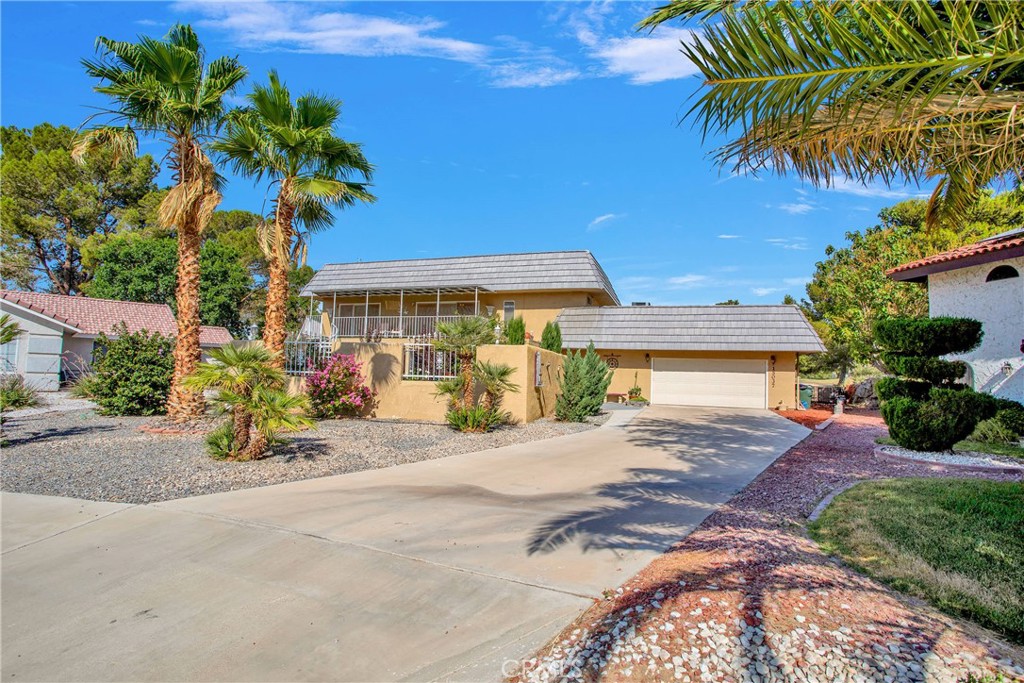 Welcome to this beautiful Mediterranean charm meets golf course living! This spacious 3-bedroom, 3-bathroom home offers 2,370 square feet of uniquely remodeled living space filled with character and comfort.
Step into a private courtyard oasis featuring a pergola-shaded patio surrounded by mature fruit trees—including a pomegranate, two cherry trees, and a lemon tree. Inside, you’ll enjoy generously sized rooms, indoor laundry, and inviting design elements throughout. A covered deck off the bonus room and primary bedroom provides a peaceful retreat—perfect for morning coffee, reading, or relaxing in the shade while overlooking the private courtyard.
Located directly on the golf course, the home also includes a dedicated golf cart garage for effortless access to the greens. As part of an amenity-rich HOA, residents enjoy golf, pickleball, tennis, a pool, spa, sauna, gym—and access to two private lakes with beaches, perfect for swimming, fishing, and family fun.
Don’t miss this rare opportunity to live where value, lifestyle, and natural beauty all come together!
