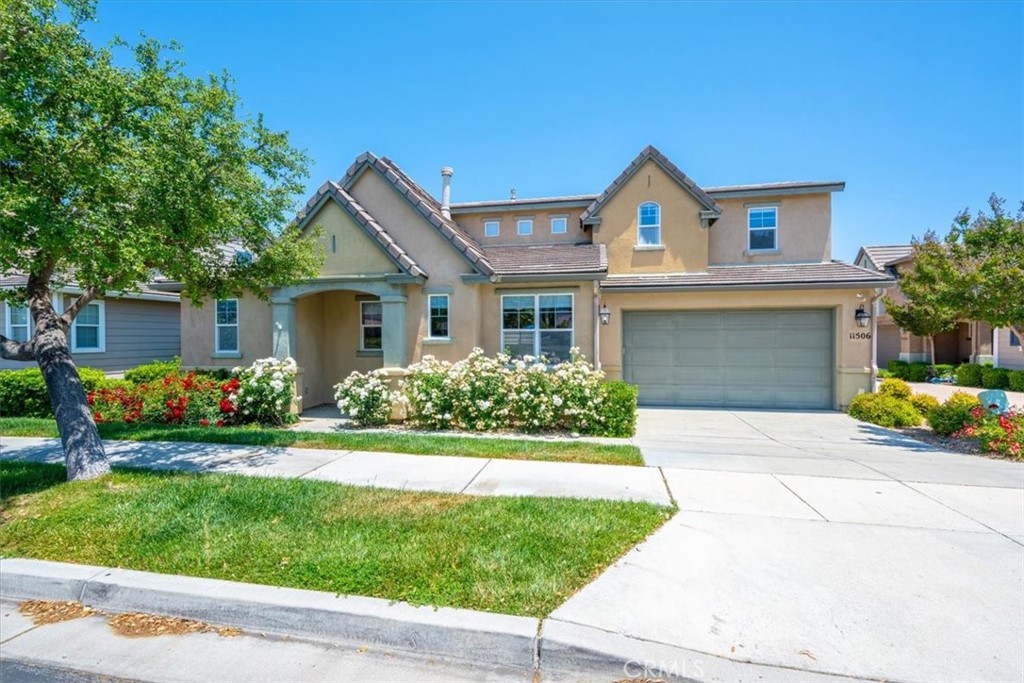 Welcome to your next chapter in the highly sought-after Dove Creek community, right across from the neighborhood park. This beautifully updated 3-bedroom, 3-bath home, plus a spacious loft, offers charm, functionality, and thoughtful upgrades in all the right places. Inside, you’ll find crisp wainscoting and detailed trim work that elevate the home’s style. The kitchen is spacious and functional, featuring a large island, stainless steel appliances, a new farmhouse sink and faucet, and generous counter space. Just off the kitchen, the laundry room offers easy garage access and includes a newer washer and dryer set. The primary suite is located downstairs for added privacy and includes a remodeled bathroom and an expanded walk-in closet. Durable vinyl flooring runs throughout the main level and the primary bathroom, blending a warm aesthetic with low-maintenance practicality. Upstairs, a large loft makes an ideal media room, office, or play area, and is paired with two additional bedrooms and a full bath. What really sets this home apart is the private driveway—rare in Dove Creek—which comfortably fits two cars side by side. The front yard is beautifully landscaped for a clean, low-maintenance lifestyle. Recent improvements include a new refrigerator, dishwasher, and stove, updated exterior light fixtures, and new cloth blinds on most windows. There’s even a storage unit and a fenced backyard with ongoing improvements. Stylish, flexible, and ideally located—this is one you don’t want to miss.