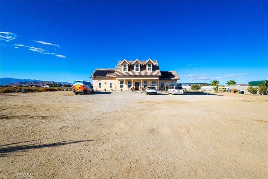 Breathtaking Mountain Views! This stunning two-story home sits on 2.5 fenced in acres of prime horse property and welcomes you with a full-length covered porch and high ceilings throughout. Inside, you’ll find 5 spacious bedrooms and 3 bathrooms with an open and inviting floor plan.

Enjoy a formal living and dining area, along with a bright, beautiful kitchen featuring laminate countertops, abundant cabinet space, white appliances, and a large pantry. The downstairs master suite includes a generous walk-in closet, granite counters, and a beautifully custom-tiled shower. You’ll also find a guest bedroom (perfect for an office) and a convenient indoor laundry room on the main floor.

Upstairs offers 3 additional bedrooms, each with double closets and high ceilings, plus a large bathroom with dual sinks, a tub/shower combo, and tile flooring. Outside, the backyard that extends further than the fence is a blank canvas ready for your personal touch—complete with horse corrals, a private well, and many different fruit trees. Come see why this isn’t just a house—it’s the perfect place to call home!