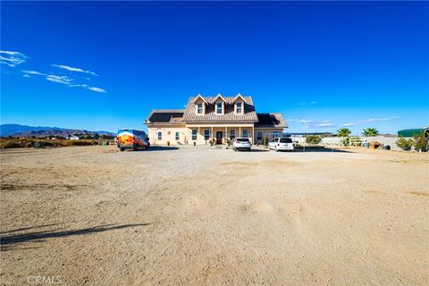 Photo of 5609 5609 Buckhorn Ave, Rosamond, CA 93560 (MLS # CV25233288)